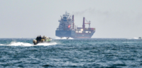 Chaos in the Strait: Three Container Ships Under Fire as Tensions Escalate